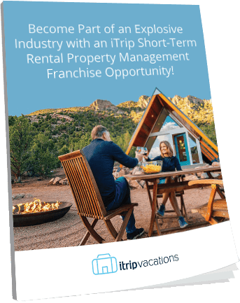 Brochure cover showing two people sitting at an outdoor table near a vacation cabin in a scenic area, promoting iTrip short-term rental property management franchise opportunities.